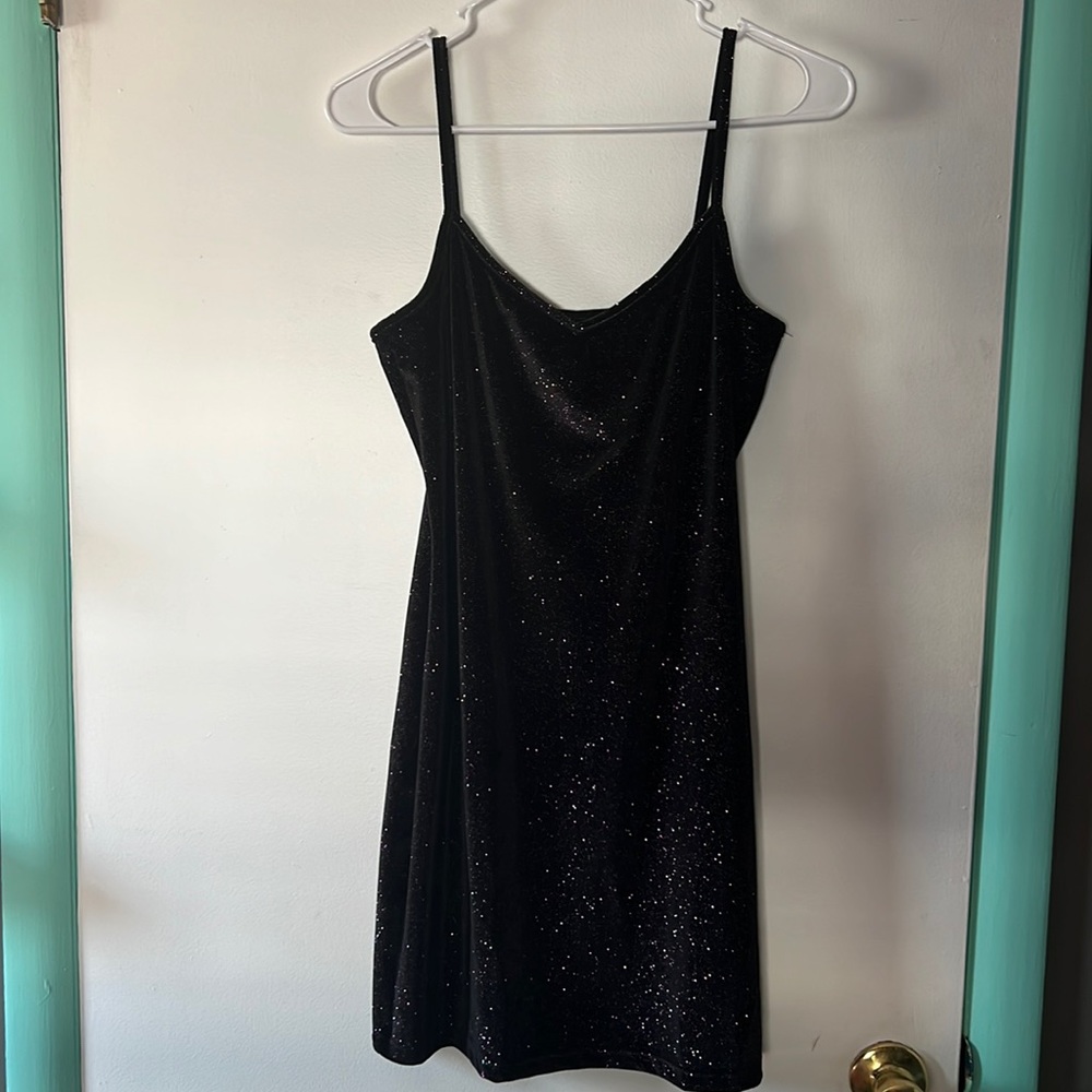 American apparel. Size large (fits more like a medium). Midnight sparkle color.
